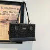Bolsa de Gran Capacidad Transfronteriza para Mujer Verano 2026 Nuevo Versátil Moda Hombro Único Tendencia Viaje Diario Retro Casual Bolso Tote