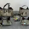 (Sin accesorios) Bolsa de cubo pequeña de alta calidad para comercio exterior, nuevo modelo 2025, bolso tote para mujer, estilo urbano maduro