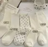 Calcetines blancos holgados para mujer, nuevos calcetines de punto de media pantorrilla con lunares para otoño e invierno, calcetines largos de malla transpirables y absorbentes de sudor para verano, Industria de Calcetines Zhuji