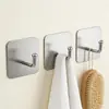 Ganchos Modernos Minimalistas de Acero Inoxidable, Ganchos Adhesivos sin Taladro para Puertas y Paredes del Baño, Uso Doméstico, Venta Directa del Fabricante, Mayoreo