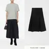 Yuran 26 Nuevo Modelo de Principios de Primavera, Vestido Negro Pequeño Abullonado de Doble Capa con Capa de Nailon Brillante de Micro-Crepé con Plisados