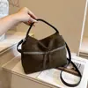 Bolso de mano de gamuza de color sólido, moderno y minimalista, estilo coreano, nueva colección otoño 2026, bolso de hombro y bolso cruzado texturizados de moda