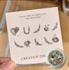 Paquete de material para manicura 2024 primavera y verano nuevo estilo mono mismo estilo hacha Corazón Torcido Cristal K9 diamante flash manicura al por mayor