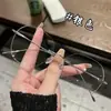Armazón de Gafas Danyang de Moda Liso Adelgazante Poligonal Anti Luz Azul Ultraligero de Titanio Puro Sin Montura Cortado al Borde para Miopía para Mujeres