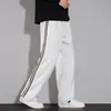 Pantalones casuales para hombre, nueva colección de otoño, caída retro, empalme de raya lateral, pantalones rectos holgados, pantalones deportivos de moda para hombre