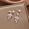 Aretes de Perlas con Lazo Estilo Ballet Aguja de Plata Pendientes Huecos de Encaje Personalidad Versátil Lujo Francés para Mujer