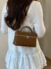Bolso de hombro casual de moda de nicho estilo coreano, bolso de mano elegante y exquisito con bloques de color, bolso cuadrado pequeño, bolso tipo caja pequeño para el trabajo