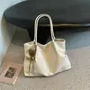 Bolsa grande retrô casual transfronteiriça para mulheres, nova bolsa tote casual para o dia a dia, bolsa de ombro de grande capacidade moderna para o trabalho