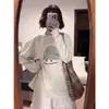 Camiseta Cinza Estilo Americano para Mulheres Outono Inicial Super Bonita Manga Longa Primavera Outono 2026 Nova Solta Estilo Preguiçoso Top para Usar por Baixo