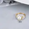 Anel de lua versão coreana transfronteiriça de prata s925 Anel aberto de pérola de água doce com diamante de temperamento feminino porta vazio fabricantes