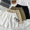 Pantalones cortos casuales de cintura holgada estilo Hong Kong para mujer, novedad de verano 2023, pantalones anchos de cintura alta y color liso para mujer
