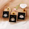 Joyería transfronteriza europea y americana se puede abrir collar de girasol con grabado a doble cara personalidad femenina retro nuevas explosiones N677