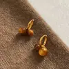 Cuff de Oreja Ojo de Tigre Melanoides Atmósfera Retro Otoño Invierno Pendientes Versátiles Pequeños Exquisitos Pendiente de Nicho de Gama Alta