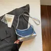 Las populares bolsos pequeños de este año para mujer 2025 nuevo verano versátil bolso de axila nicho sensación de alta gama bolso de un solo hombro cruzado