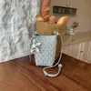 Bolso de teléfono tejido de diseño de nicho versátil 2026 transfronterizo para el trabajo, bolso de hombro/cruzado moderno y simple