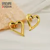 Brincos de Tarraxa Coração Vazado Europeus e Americanos Banhados a Ouro Personalidade Feminina Retro Minimalista Temperamento Coração Metálico em Forma de Coração Brincos de Tarraxa Femininos