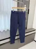 ¡Estilo de pierna cónica! ¡Tejido Toray de capa de aire! Moda masculina otoño e invierno color liso cremallera versátil hoja curva pantalones casuales