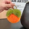 Colgante de caqui de piel sintética de conejo Rex al por mayor Caqui Ruyi llavero para coche colgante de bola de piel colgante para bolsa pequeño regalo