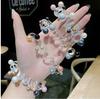 Diadema de cable de teléfono para mujer, temperamento de celebridad de internet, cuerda para la cabeza de perla, color versátil, anillo de teléfono transparente, sin costuras, no daña el cabello, accesorios para el cabello