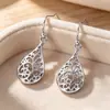 Brincos de cobre Yanbai transfronteiriços europeus e americanos vintage vazados em forma de gota d'água, brincos femininos modernos, de luxo leve, elegantes e versáteis