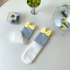 Calcetines mujer otoño e invierno nueva colección de muñecas lindas calcetines de tubo de forro polar coral grueso cálido para el hogar para dormir venta al por mayor