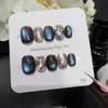 Padrão Onda EstelarMar Noturno Olho de Gato Nail Art Gradiente Azul e Preto Padrão Xadrez com Pedras de Strass Brilhantes e Nebulosa Unhas Usáveis Feitas à Mão
