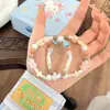 Pulsera Linda Nueva Alto Valor de Color Gatito Perro Cerámica Pareja Nicho Diseño de Cuerda para la Mano Novia Pulsera Desgastada