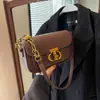 Bolso de lujo ligero francés para mujer 2023 otoño e invierno popular belleza estilo Deyang cierre candado bandolera de cadena