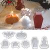Una variedad de moldes de silicona para velas de Halloween, moldes de resina con pegamento para gotas de resina, moldes para velas con pegamento para gotas de calavera y calabaza fantasma.