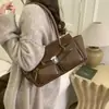 Bolso Tote de Moda con Diseño de Nicho para Mujer 2025 Nuevo Otoño e Invierno Retro Gran Capacidad Elegante Versátil Bolso de Hombro