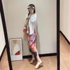 ¡Qué Bello Contraste! 25 Nuevo Diseño de Estampado Geométrico de Primavera y Verano Falda Plisada Falda Recta con Abertura