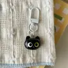 Llavero de Gatito con Expresión Linda y Divertida, Colgante Fresco y Sencillo, Dulce y Versátil Accesorio de Regalo para Mochilas