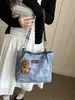 Bolsa feminina de grande capacidade 2026 nova bolsa de ombro versátil para estudantes, adequada para aula e deslocamento, bolsa tote com design único