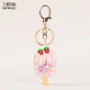 Llavero de Botella de Arena Líquida de Helado de Burbujas de Fresa Relleno de Aceite Original Lindo Dibujo Animado Color Macarrón Colgante para Bolsa de Niña