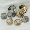 Botón de metal de alta gama girasol full diamond luz de lujo estilo japonés y coreano botón de diamante en forma de flor moda abrigo de lana moderno