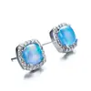 Moda de deseo transfronteriza para commuters, aretes Aobao de cuatro garras con incrustaciones de diamante blanco, azul y blanco, naturales, simples, venta al por mayor, generación