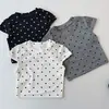 Camiseta de Verano de Manga Corta para Niñas Bebés Niños Marca de Moda Estilo Coreano Ajustada Corta con Lunares Hombros Descubiertos Top Nuevo Estilo 2026