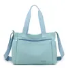 Bolsa Feminina 2025 Nova Tendência Transfronteiriça Tecido de Nylon Bolsa de Ombro de Grande Capacidade Bolsa Transversal Portátil Feminina Leve