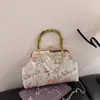 Nuevo Bolso de Cena Bordado Estilo Chino Estilo Nacional 2025 Nuevo Bolso Cruzado con Cadena de Perlas Bolso de Hombro Nicho Retro Bolso Dorado