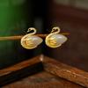 Elliform Aguja de Plata 925 Método Antiguo Chapado en Oro Imitación Jade Hetian Jade Blanco Personalizado Simple Versátil Aretes de Cisne Aretes