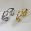 Pulsera abierta de múltiples hilos retorcidos, de moda europea y americana, para mujer, diseño de nicho de lujo ligero, estilo metálico, exquisita y versátil para el uso diario