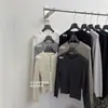 Suéter Tejido Coreano de una Sola Fila de Trece Hileras 2026 Otoño/Invierno Lana 2026 Otoño/Invierno Estilo Nuevo Artístico de Manga Larga con Media Botonadura