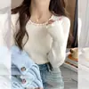 Camiseta base de borde con volantes para mujer, nuevo top de punto interior elegante estilo Chanel para principios de primavera 2025, suéter de cuello redondo de primavera