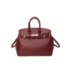 Elegante bolsa de mão preta platina para mulheres, novo modelo outono e inverno 2026, bolsa de mão de grande capacidade com padrão texturizado, bolsa tote para o dia a dia