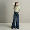 Jeans de campana negros de tiro alto elásticos en cuatro direcciones para mujer, ajuste holgado, adelgazantes, cubren la cadera, modernos y versátiles, talla juvenil naranja
