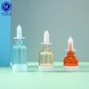 En stock, botella cosmética de 5 ml, 10 ml y 15 ml, subbotella de esencia de ácido hialurónico líquido, botella de loción con bulbo.