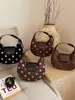 Bolsa tote transfronteiriça de grande capacidade, moderna, minimalista e elegante para o dia a dia, com design de nicho estilo coreano, e pode ser usada como bolsa de ombro ou transversal.