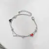 Electrochapado en oro real circón microincrustado temperamento joyería de mano femenina diseño de nicho sentido pulsera de amor de doble capa Fábrica de origen
