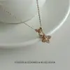 Exquisito Collar con Colgante de Flor de Cuatro Hojas Hueca con Microincrustaciones de Circonita, Cadena para Clavícula Versátil de Lujo Ligero de Nicho