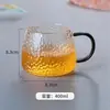 Taza Martillo de Vidrio de Borosilicato Alto al por Mayor Estilo Japonés Simple Taza de Café Martillo Taza Martillo de Vidrio de Borosilicato Alto con Mango de Color